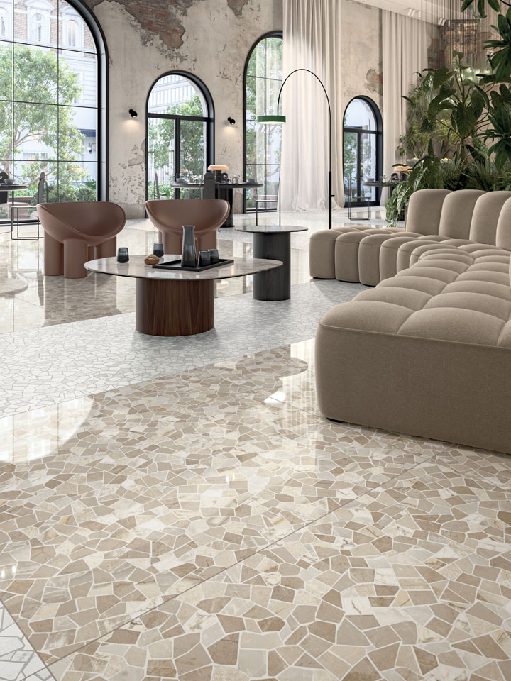 Salotto con doppio pavimento Aurea e Luce
